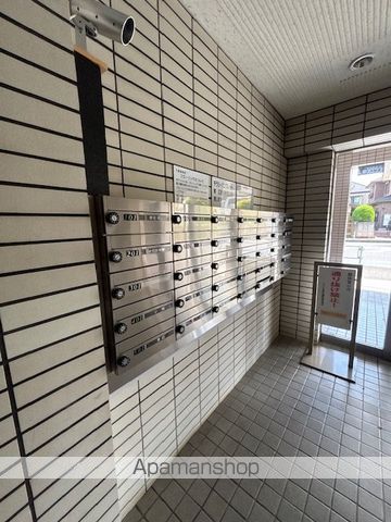 コスモ東岩槻の玄関写真
