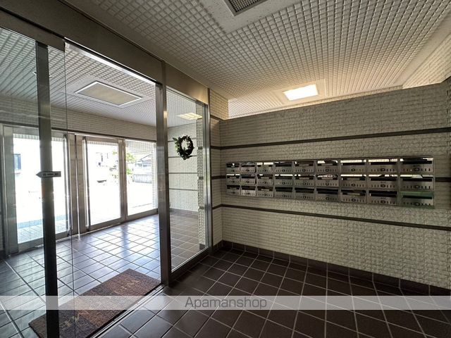 トーカンキャステール日の出町の玄関写真